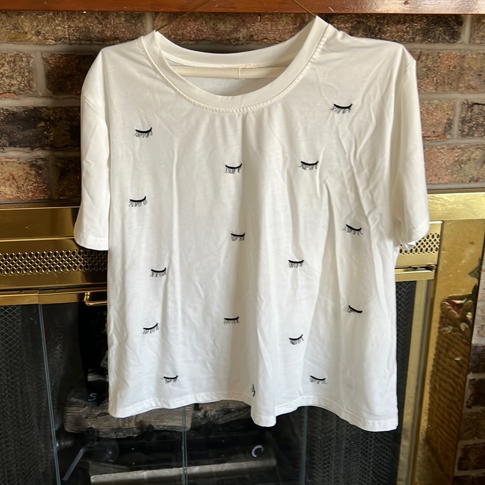 Current Air White Tee with Black Eyelash Print